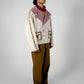This unisex jacket features an oversized double lapel crop silhouette and mulberry silk liniing. 