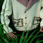 This unisex jacket features an oversized double lapel crop silhouette and mulberry silk liniing. 
